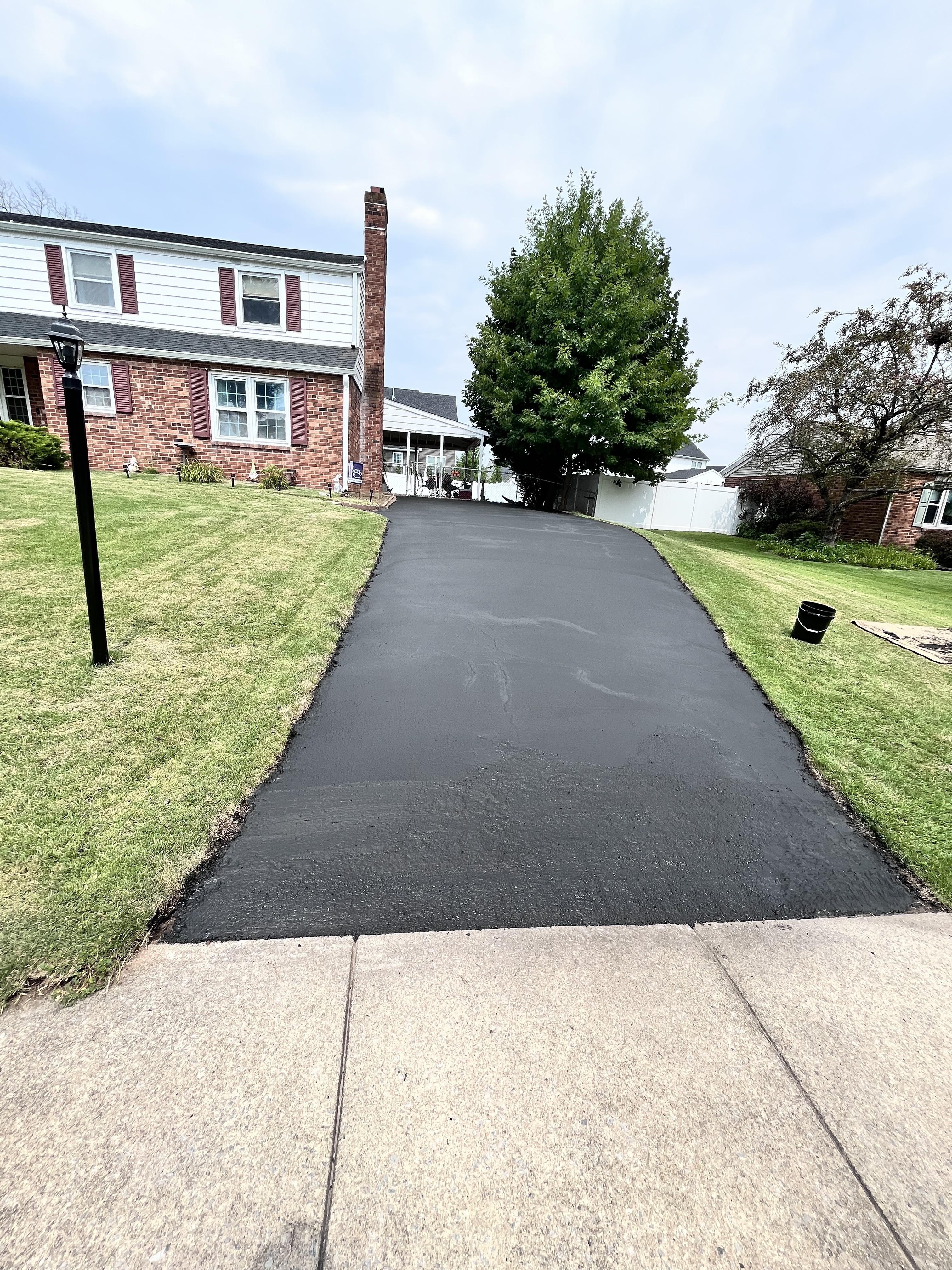 Driveway after repair and sealcoating